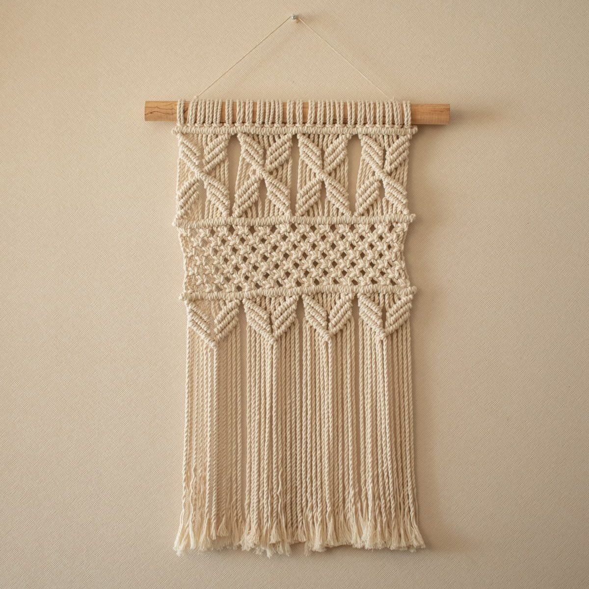 Mural de macramé minimalista
